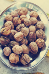 walnuts on a metal plate,vintage