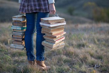 Girls hands holding books