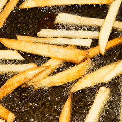 French fries are fried in a pan