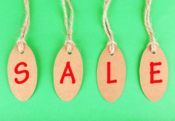 Sale tags on colorful background