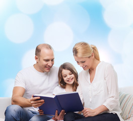 happy family with book at home