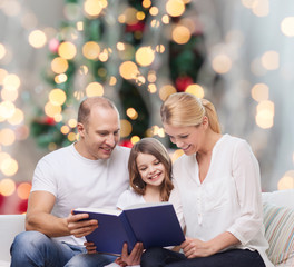 happy family with book at home