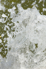 rough water with splashes on nature