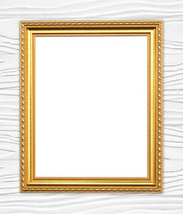 blank golden frame on wood wall