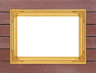 blank golden frame on wood wall