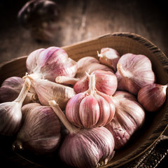 garlic bulb on rustic wooden background