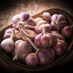 garlic bulb on rustic wooden background