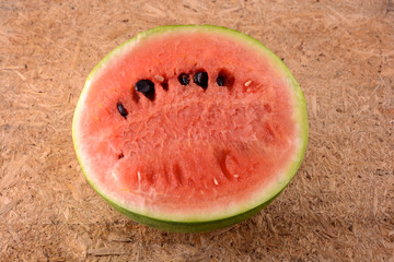 fresh watermelon fruit on wooden background