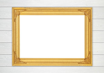 blank golden frame on wood wall