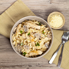 Pasta with chicken and cream mushroom sauce