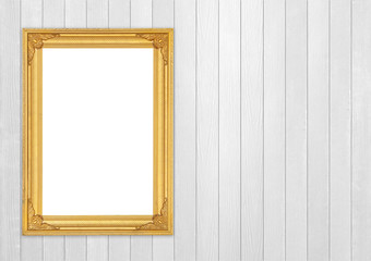 Obraz na płótnie Canvas blank golden frame on wood wall