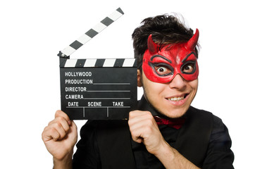 Devil with movie board isolated on white