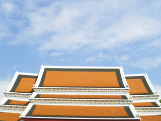 Fototapeta premium The Beautiful roof of temple on blue sky background