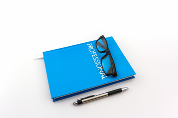 Blue diary book with the word" professional" .