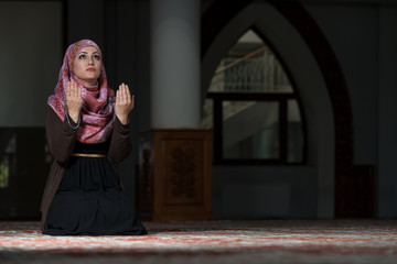 Young Muslim Woman Praying