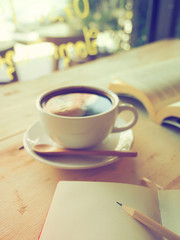 Pencils on the green cup