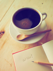 Pencils on the green cup