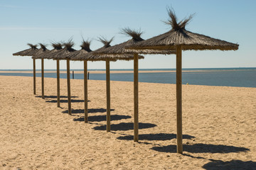 thatched umbrellas