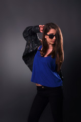 trendy woman posing with sunglasses