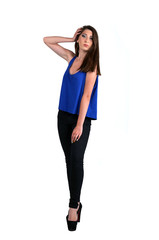 Fototapeta premium Young fashion model posing with hand in hair