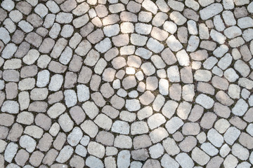 Mosaik aus ovalen Pflastersteinen