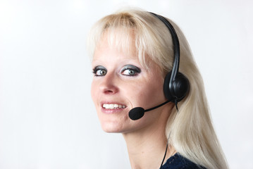 Portrait of young woman with headset