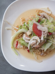 closed up spicy mixed salad with noodle shrimp and vegetabels