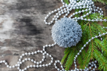 Silver Christmas ball on wooden background