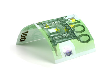 House made from euro bills isolated on white background