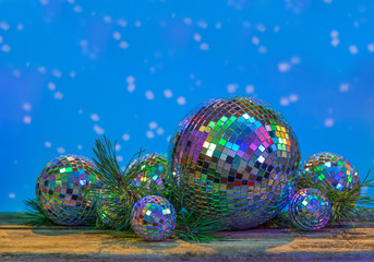 Christmas Mirror balls on wooden background