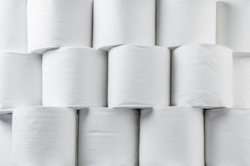 Stack of white tissue paper rolls.