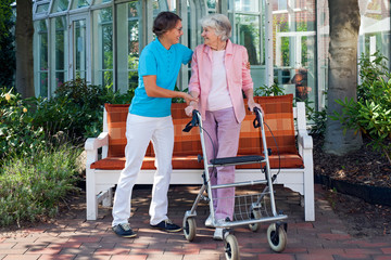 Elderly woman with her loving daughter.