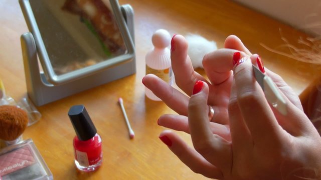 Manicure Process. Female Applying Nail Polish to Hand.