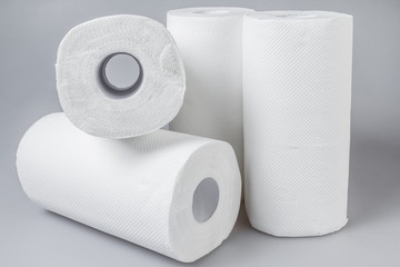 Stack of white tissue paper rolls.