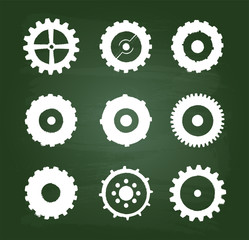 Cog Wheels Icons Set On Green Chalkboard