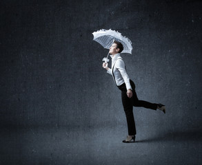 business woman run with white umbrella