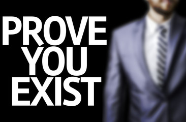 Prove you Exist written on a board