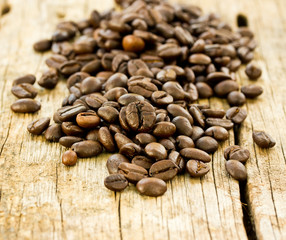 coffee beans on wooden background