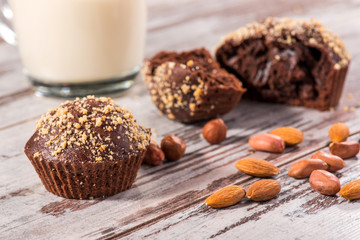 Close-up picture of chocolate cupcake with almonds and hazelnut