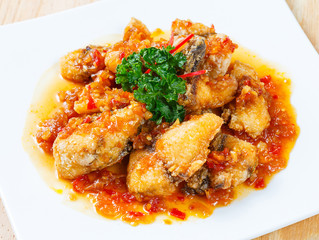 Deep fried grouper fish spicy sweet and sour sauce