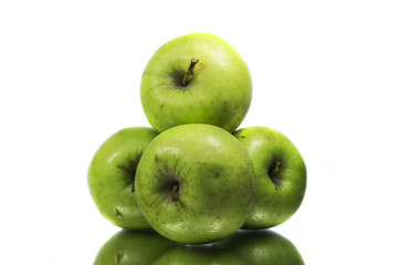Four green apples