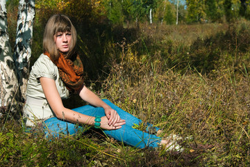 The girl has a rest outdoors