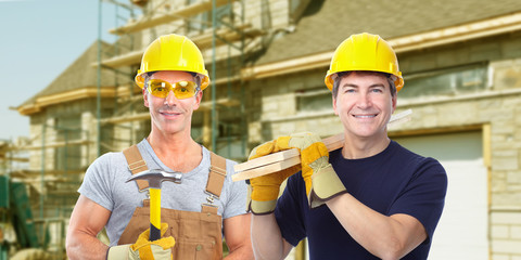 Handyman with a hammer. House renovation.