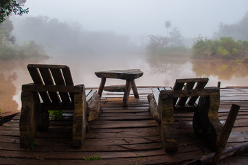 Relaxing on a foggy lake, early morning, Argentina