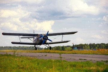 Fototapeta na wymiar Takeoff of the old Russian plane