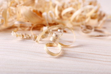 Heap of chips on wooden background closeup
