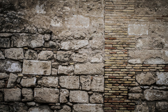 textured stone wall, Spanish city of Valencia, Mediterranean arc