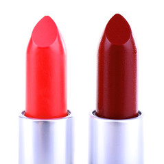 Red lipsticks isolated on white