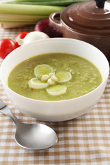 Leek soup on table, close up
