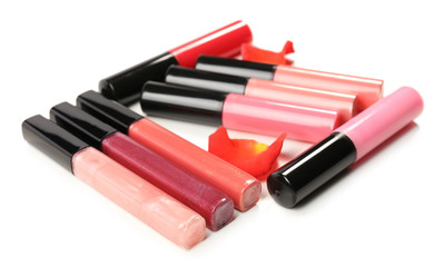 Beautiful lip glosses, isolated on white